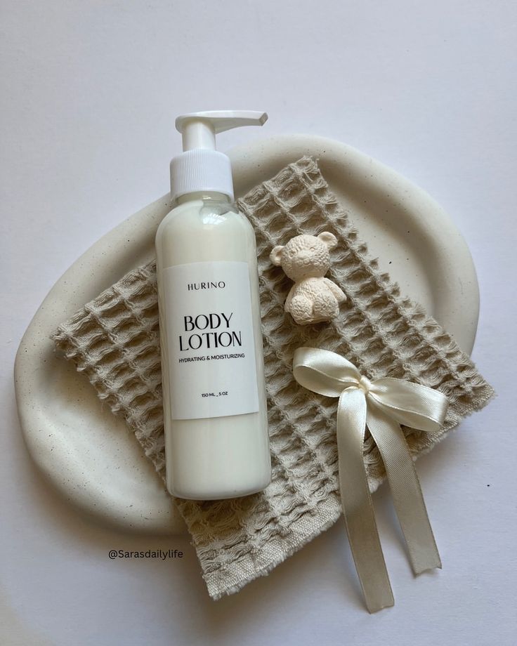 body lotion on waffle towel flat lay